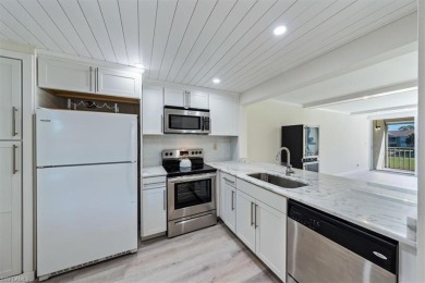WOW! Fabulously updated 2nd floor unit with a perfect North on Quail Run Golf Club In Naples in Florida - for sale on GolfHomes.com, golf home, golf lot