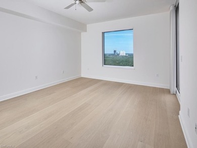 Soaked in natural light, this 10th-floor residence at La Scala on The Colony Golf and Country Club in Florida - for sale on GolfHomes.com, golf home, golf lot