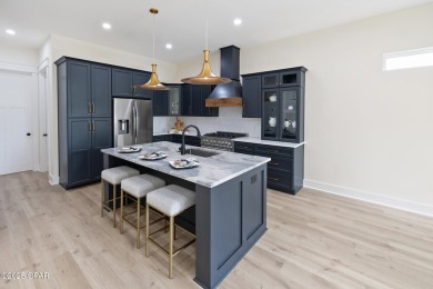 Discover luxury living and unmatched flexibility in this on Bay Point Resort Golf Club in Florida - for sale on GolfHomes.com, golf home, golf lot