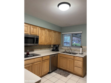 Welcome to this well maintained ranch with 3 bedrooms and 2 on Cherry Creek Golf Club in Michigan - for sale on GolfHomes.com, golf home, golf lot