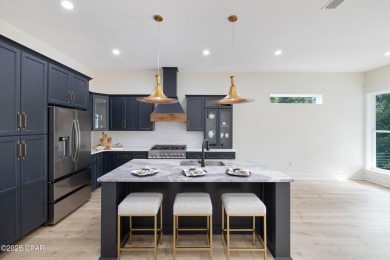 Discover luxury living and unmatched flexibility in this on Bay Point Resort Golf Club in Florida - for sale on GolfHomes.com, golf home, golf lot