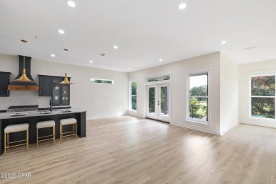Discover luxury living and unmatched flexibility in this on Bay Point Resort Golf Club in Florida - for sale on GolfHomes.com, golf home, golf lot