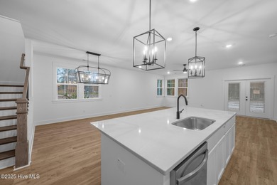 Introducing the Roberts plan by Hunter Quinn Homes in the on Brunswick Plantation and Golf Resorts in North Carolina - for sale on GolfHomes.com, golf home, golf lot