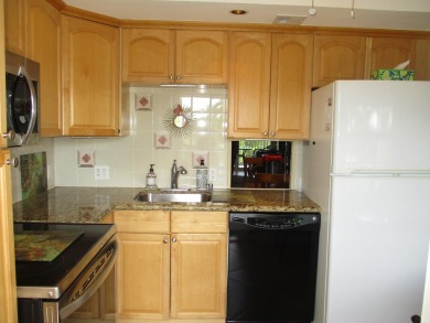 Welcome to this beautifully furnished upgraded 2-bedroom on Palm-Aire Country Club and Resort - Palms in Florida - for sale on GolfHomes.com, golf home, golf lot