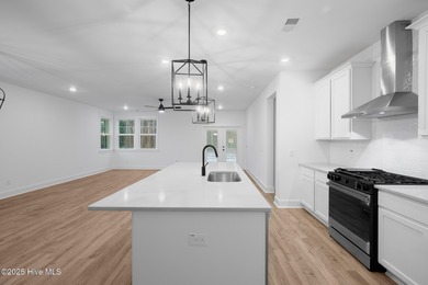 Introducing the Roberts plan by Hunter Quinn Homes in the on Brunswick Plantation and Golf Resorts in North Carolina - for sale on GolfHomes.com, golf home, golf lot