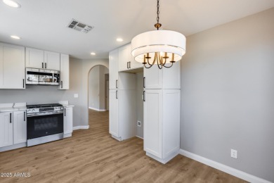 This beautifully remodeled 2-bedroom, 2-bathroom home is nestled on Oakwood Golf Club  in Arizona - for sale on GolfHomes.com, golf home, golf lot