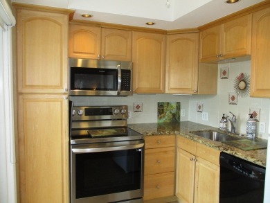 Welcome to this beautifully furnished upgraded 2-bedroom on Palm-Aire Country Club and Resort - Palms in Florida - for sale on GolfHomes.com, golf home, golf lot