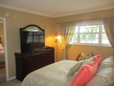 Welcome to this beautifully furnished upgraded 2-bedroom on Palm-Aire Country Club and Resort - Palms in Florida - for sale on GolfHomes.com, golf home, golf lot