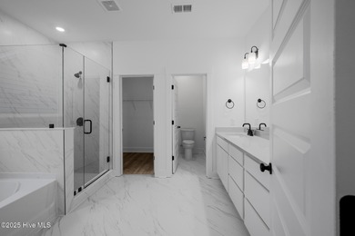 Introducing the Roberts plan by Hunter Quinn Homes in the on Brunswick Plantation and Golf Resorts in North Carolina - for sale on GolfHomes.com, golf home, golf lot