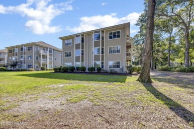 First-Floor End-Unit Condo in River Creek II - Sea Trail on Sea Trail Golf Resort in North Carolina - for sale on GolfHomes.com, golf home, golf lot