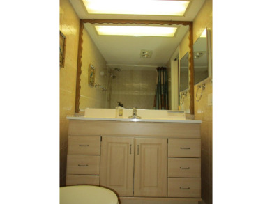 Welcome to this beautifully furnished upgraded 2-bedroom on Palm-Aire Country Club and Resort - Palms in Florida - for sale on GolfHomes.com, golf home, golf lot