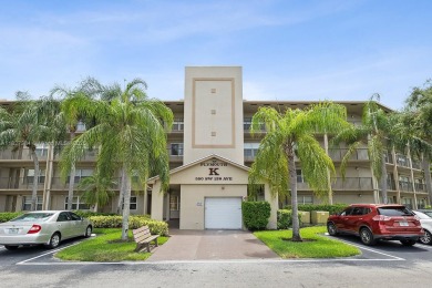 Experience luxury living in this stunning breathtaking lake view on Flamingo Lakes Country Club in Florida - for sale on GolfHomes.com, golf home, golf lot
