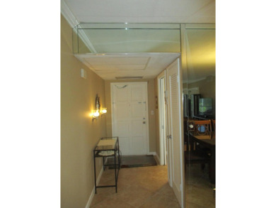 Welcome to this beautifully furnished upgraded 2-bedroom on Palm-Aire Country Club and Resort - Palms in Florida - for sale on GolfHomes.com, golf home, golf lot