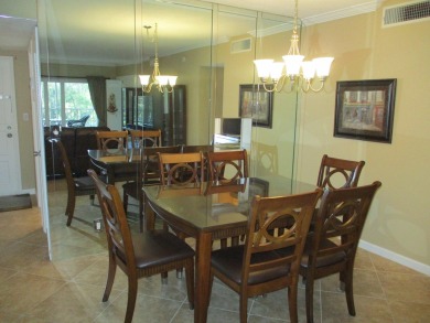 Welcome to this beautifully furnished upgraded 2-bedroom on Palm-Aire Country Club and Resort - Palms in Florida - for sale on GolfHomes.com, golf home, golf lot