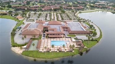Experience luxury living in this stunning breathtaking lake view on Flamingo Lakes Country Club in Florida - for sale on GolfHomes.com, golf home, golf lot