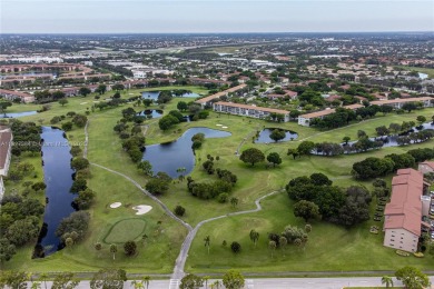 Experience luxury living in this stunning breathtaking lake view on Flamingo Lakes Country Club in Florida - for sale on GolfHomes.com, golf home, golf lot
