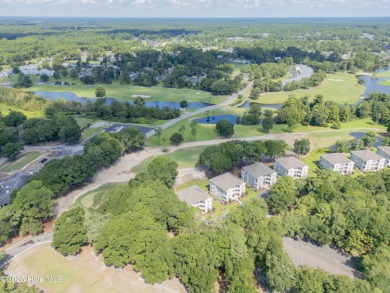First-Floor End-Unit Condo in River Creek II - Sea Trail on Sea Trail Golf Resort in North Carolina - for sale on GolfHomes.com, golf home, golf lot