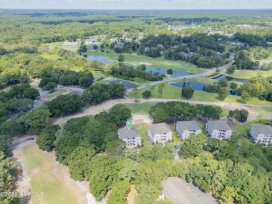First-Floor End-Unit Condo in River Creek II - Sea Trail on Sea Trail Golf Resort in North Carolina - for sale on GolfHomes.com, golf home, golf lot