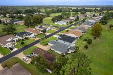 Welcome to this beautiful 3-bedroom, 2-bath, 2-car garage rare on Summerglen Country Club in Florida - for sale on GolfHomes.com, golf home, golf lot