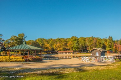 Stunning Lakeview Pocono vacation home nested in popular Lake on Split Rock Resort and Country Club in Pennsylvania - for sale on GolfHomes.com, golf home, golf lot