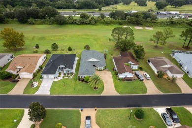 Welcome to this beautiful 3-bedroom, 2-bath, 2-car garage rare on Summerglen Country Club in Florida - for sale on GolfHomes.com, golf home, golf lot