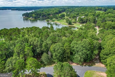 Located in the prestigious Great Waters neighborhood of Reynolds on Great Waters Course At Reynolds Plantation in Georgia - for sale on GolfHomes.com, golf home, golf lot