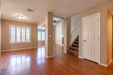 Welcome to this delightful 2-story residence nestled within the on Painted Desert Golf Club in Nevada - for sale on GolfHomes.com, golf home, golf lot