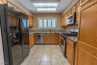 Welcome to this delightful 2-story residence nestled within the on Painted Desert Golf Club in Nevada - for sale on GolfHomes.com, golf home, golf lot