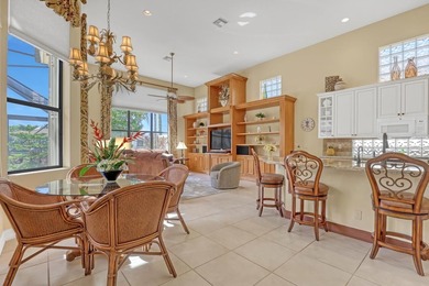 Wake up to tranquil water and fairway views in this light-filled on  in Florida - for sale on GolfHomes.com, golf home, golf lot