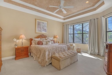 Wake up to tranquil water and fairway views in this light-filled on  in Florida - for sale on GolfHomes.com, golf home, golf lot