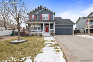 This lovely, spacious Woodmen Hill home awaits you.  Great curb on Antler Creek Golf Course in Colorado - for sale on GolfHomes.com, golf home, golf lot