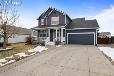 This lovely, spacious Woodmen Hill home awaits you.  Great curb on Antler Creek Golf Course in Colorado - for sale on GolfHomes.com, golf home, golf lot