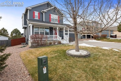 This lovely, spacious Woodmen Hill home awaits you.  Great curb on Antler Creek Golf Course in Colorado - for sale on GolfHomes.com, golf home, golf lot