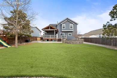 This lovely, spacious Woodmen Hill home awaits you.  Great curb on Antler Creek Golf Course in Colorado - for sale on GolfHomes.com, golf home, golf lot