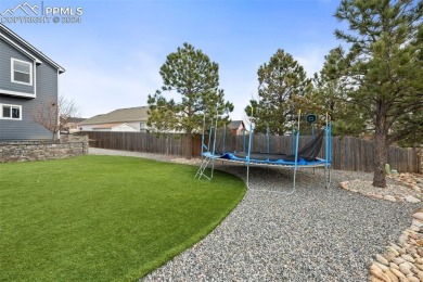 This lovely, spacious Woodmen Hill home awaits you.  Great curb on Antler Creek Golf Course in Colorado - for sale on GolfHomes.com, golf home, golf lot