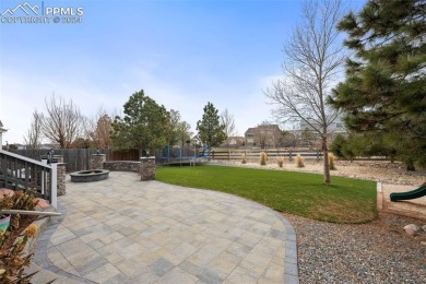 This lovely, spacious Woodmen Hill home awaits you.  Great curb on Antler Creek Golf Course in Colorado - for sale on GolfHomes.com, golf home, golf lot