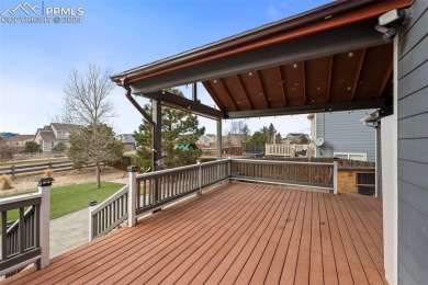 This lovely, spacious Woodmen Hill home awaits you.  Great curb on Antler Creek Golf Course in Colorado - for sale on GolfHomes.com, golf home, golf lot