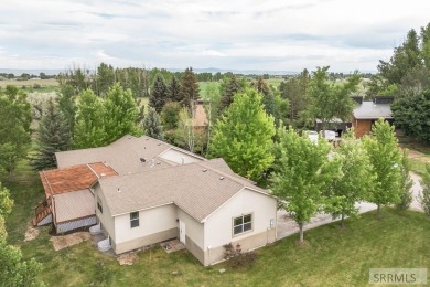 Welcome to your dream home in Idaho Falls! This beautifully on Sage Lakes Municipal Golf Course in Idaho - for sale on GolfHomes.com, golf home, golf lot