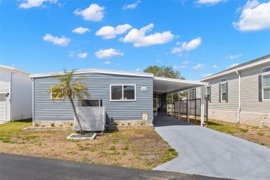 Show stopper! This totally remodeled rare 3 bedroom/2 bath on Mangrove Bay Golf Course in Florida - for sale on GolfHomes.com, golf home, golf lot