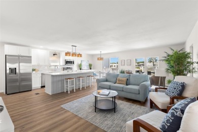 Show stopper! This totally remodeled rare 3 bedroom/2 bath on Mangrove Bay Golf Course in Florida - for sale on GolfHomes.com, golf home, golf lot