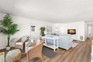 Show stopper! This totally remodeled rare 3 bedroom/2 bath on Mangrove Bay Golf Course in Florida - for sale on GolfHomes.com, golf home, golf lot