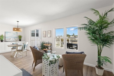 Show stopper! This totally remodeled rare 3 bedroom/2 bath on Mangrove Bay Golf Course in Florida - for sale on GolfHomes.com, golf home, golf lot