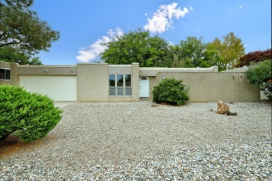 Location, Location, Location! This lovely 3/4 bedroom, 2 bath, 2 on Arroyo Del Oso Golf Course in New Mexico - for sale on GolfHomes.com, golf home, golf lot