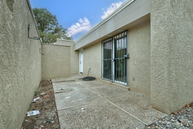 Location, Location, Location! This lovely 3/4 bedroom, 2 bath, 2 on Arroyo Del Oso Golf Course in New Mexico - for sale on GolfHomes.com, golf home, golf lot