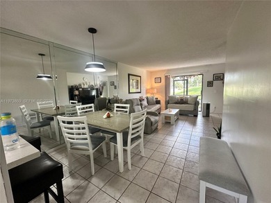HIGHLY SOUGHT AFTER GROUND FLOOR 2/2 CONDO UNIT! ALL TILES, NEW on Sunrise Lakes Phase IV Golf Course in Florida - for sale on GolfHomes.com, golf home, golf lot
