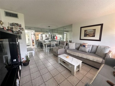 HIGHLY SOUGHT AFTER GROUND FLOOR 2/2 CONDO UNIT! ALL TILES, NEW on Sunrise Lakes Phase IV Golf Course in Florida - for sale on GolfHomes.com, golf home, golf lot