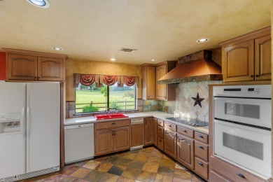 Discover your ideal retreat in this spacious 3,304 sq. ft. home on Slick Rock Golf Course - Horseshoe Bay in Texas - for sale on GolfHomes.com, golf home, golf lot