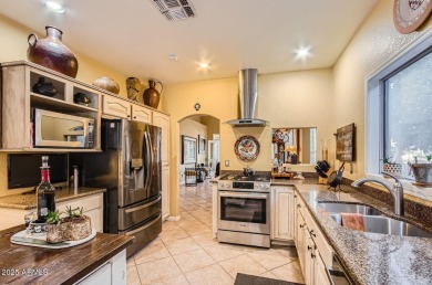Nestled within the gated active-adult community of Oakwood at on Oakwood Golf Club  in Arizona - for sale on GolfHomes.com, golf home, golf lot