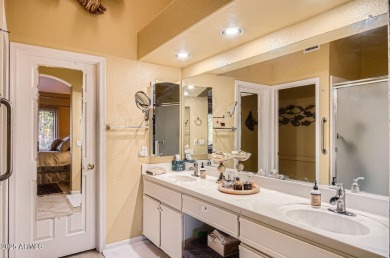 Nestled within the gated active-adult community of Oakwood at on Oakwood Golf Club  in Arizona - for sale on GolfHomes.com, golf home, golf lot