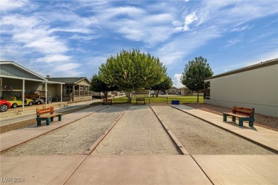 Welcome to this pristine gem in a 55+ gated golf course on Desert Greens Golf Course in Nevada - for sale on GolfHomes.com, golf home, golf lot